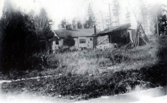 A 1934 photo showed the east side of the Conroy house with Mike Shea's shack next to it. The photographer is standing in 35th Ave NE at NE 87th Street.