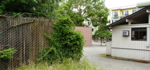 The Conroy's horse barn was on 86th just west of 35th Ave NE, near the present site of the Morningside electrical substation (fenced area.) In the background can be seen the new Jasper Apartment building.