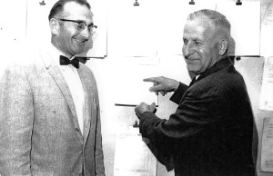 LeRoy Mock (dark suit) at his office in the Shoreline School District in the 1940's.