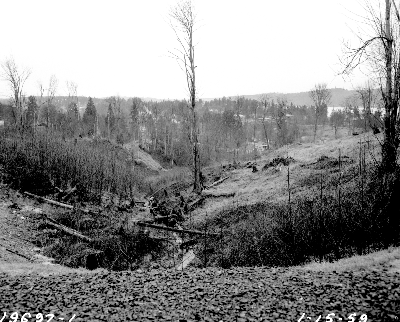 Looking east toward Lake Washington from NE 88th Street and Paisley Drive NE, we see eroded areas due to the lack of vegetation to hold the soil. Photo #60493, January 1959, Seattle Municipal Archives.