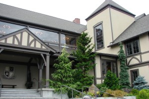 The Sand Point Country Club building, first constructed in 1930, has been remodelled and enlarged.