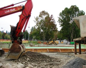 Looking north on 35th Ave NE we see rebuilding of the roadbed at NE 107th Street where new, much larger culverts were put in to carry the south branch of Thornton Creek eastward to Meadowbrook Pond.