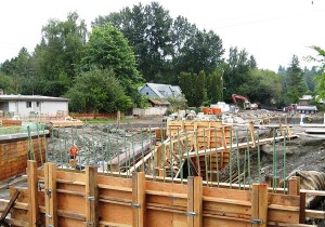 As of August 2014 there was a support structure at the edge of 35th Ave NE.  Looking east, we see the future floodplain and the new creekbed.