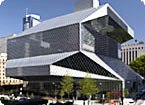 The downtown Seattle Public Library is located at 4th and Spring Streets.