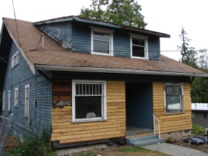 The Blue House is in rough shape after more than fifty years of hard usage as a boarding house.