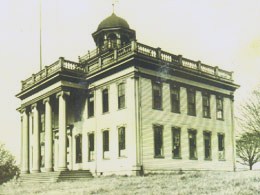The Territorial University was built in 1861 at Fourth and University Streets.